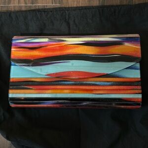 Sondra Roberts multicolor hard case clutch in excellent condition